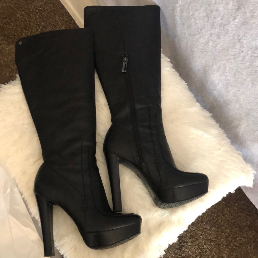 Black leather Calvin Klein heeled boots